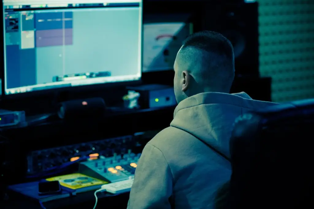 Businessman monitoring multiple screens with trading bots