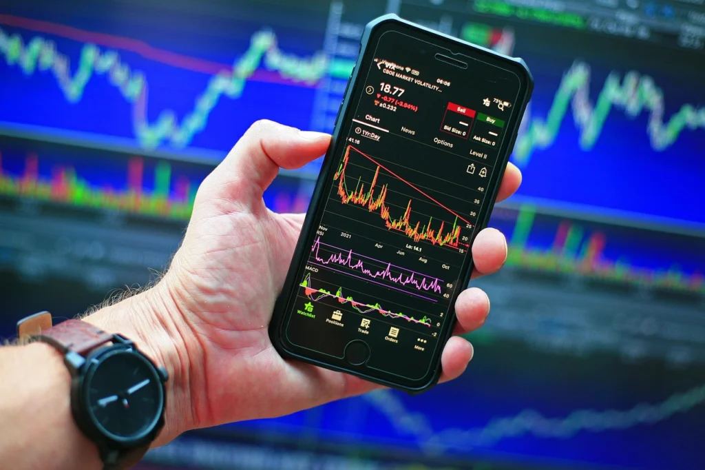Trading charts on a computer screen showing price differences