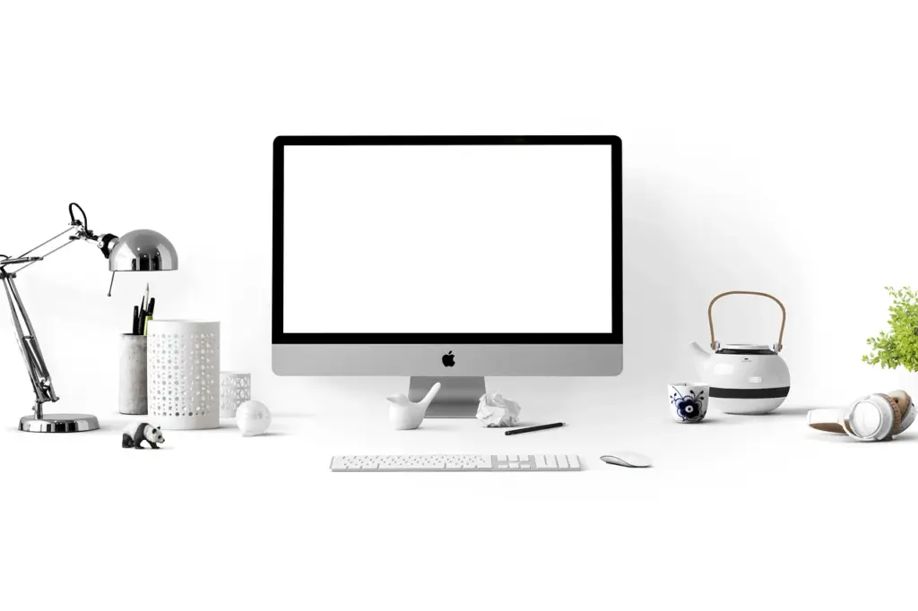 Trader desk with multiple monitors showing market prices