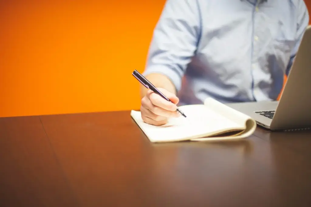 Notebook and pen for planning and recording trades