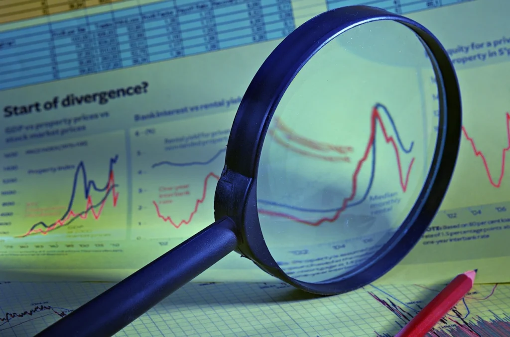 magnifying glass over a crypto price chart